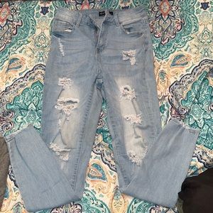 Light wash Ripped Skinny Blue Jeans